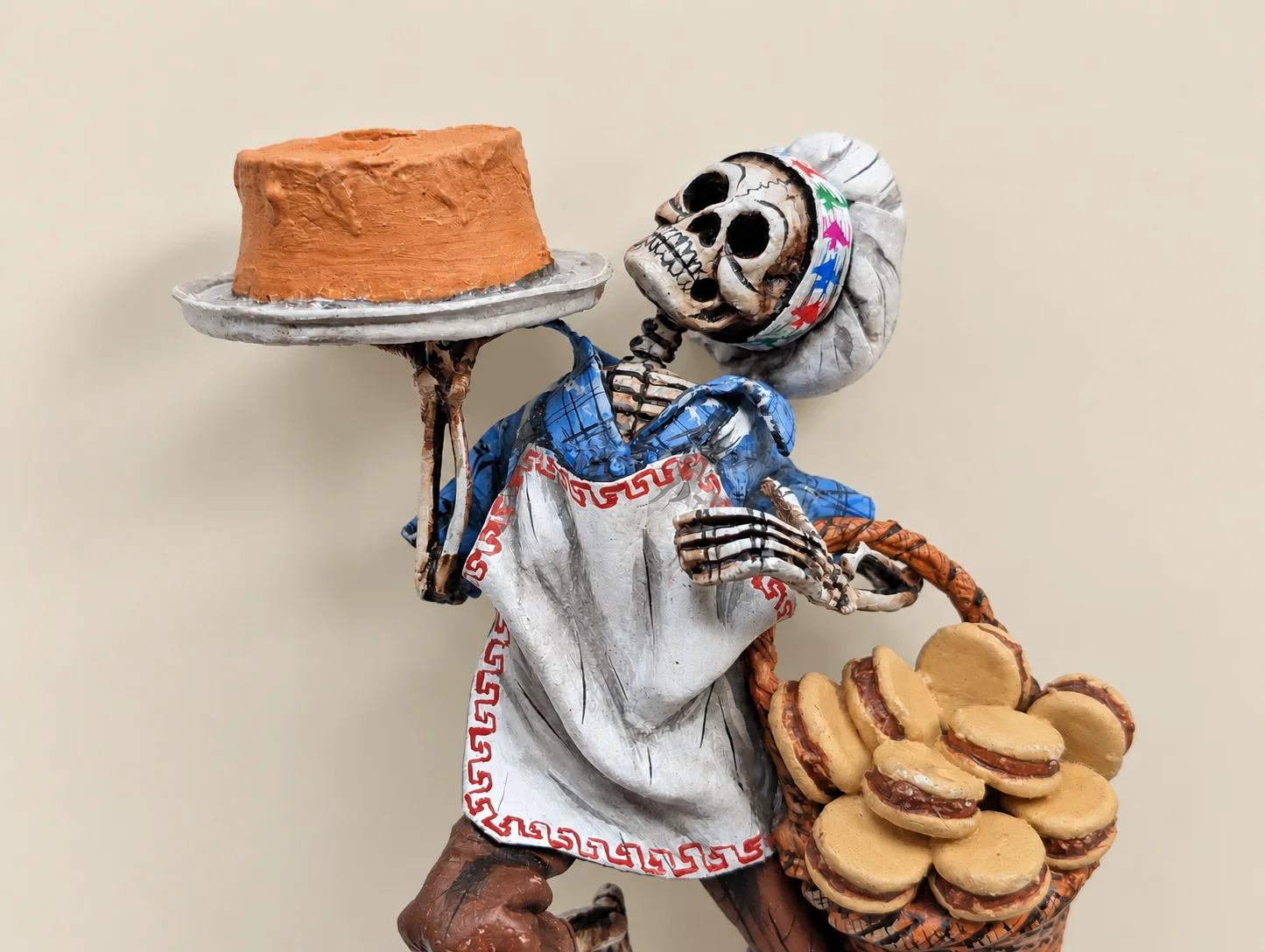 Skeleton bread seller figure with basket