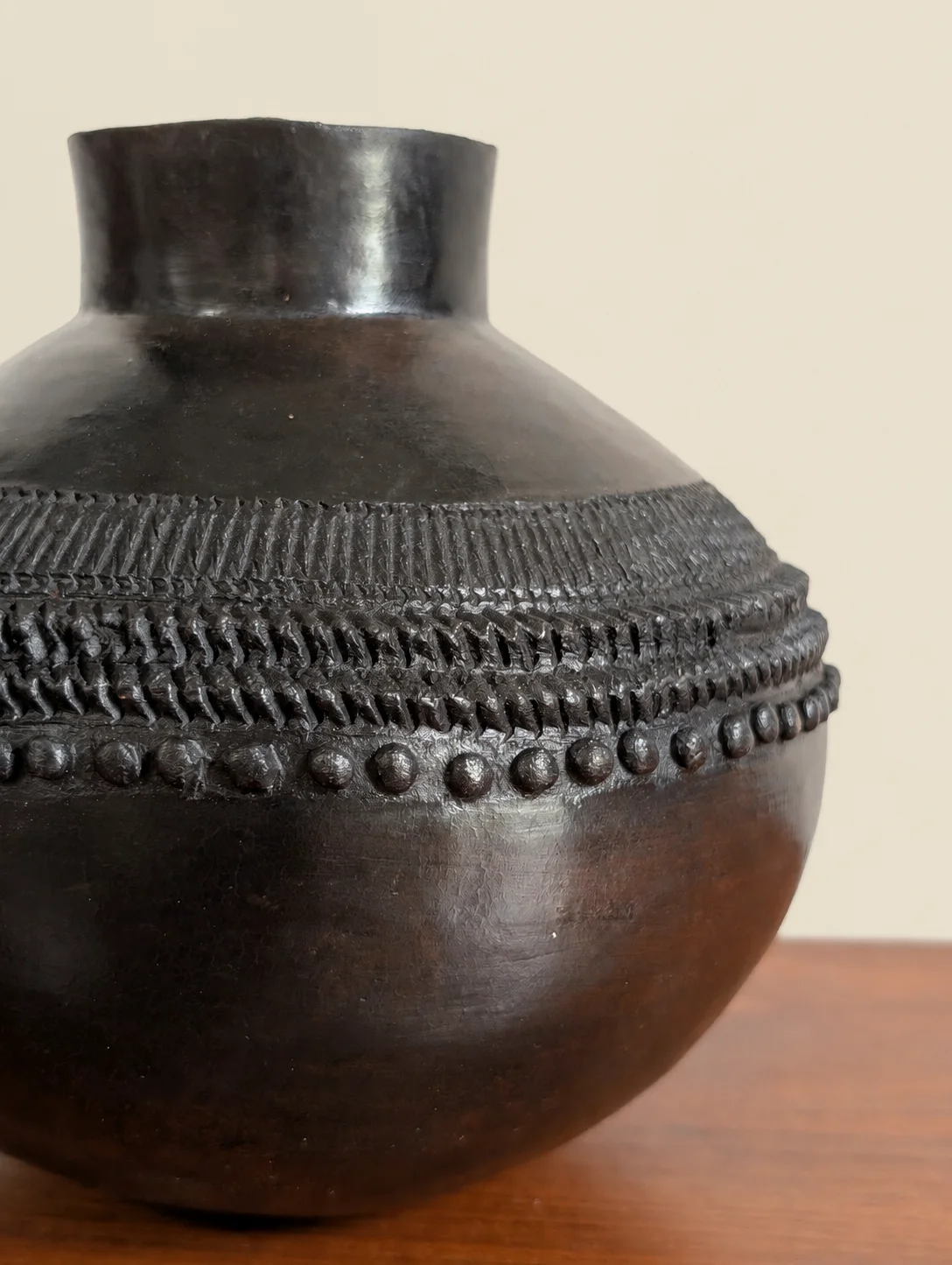 Incised black clay pot